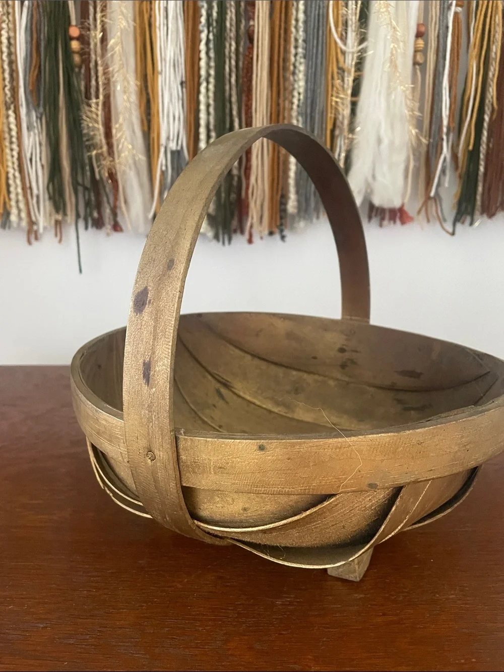 Distressed gold basket with handle